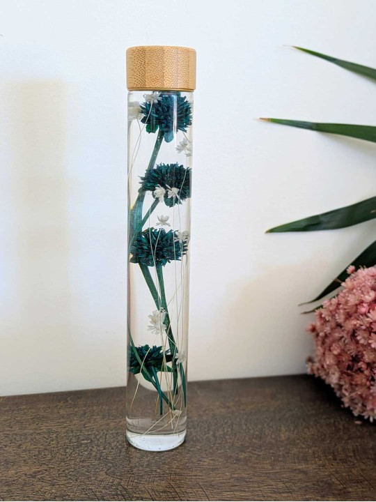 Fleur immergée turquoise / blanche Fleur immergée turquoise / blanche