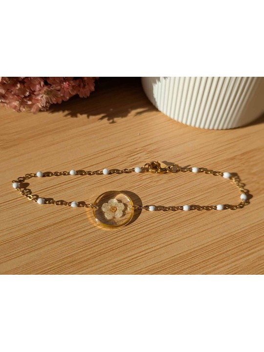 Bracelet contenant une véritable fleur beige Bracelet contenant une véritable fleur beige