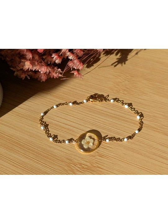 Bracelet contenant une véritable fleur beige Bracelet contenant une véritable fleur beige