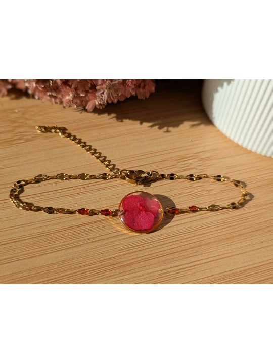 Bracelet contenant une véritable fleur rouge Bracelet contenant une véritable fleur rouge