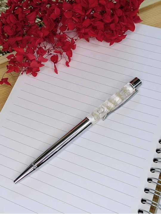 Stylo fleur immergée blanche