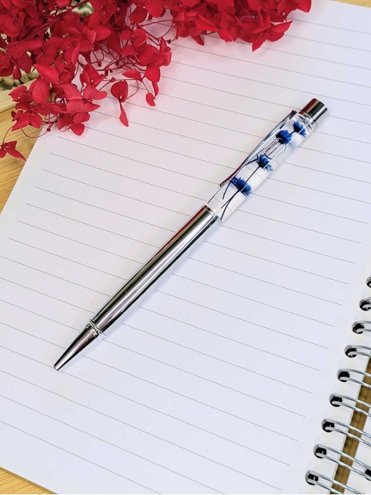 Stylo fleur immergée bleue Stylo fleur immergée bleue