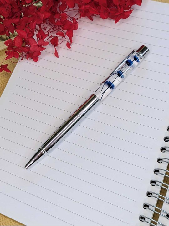 Stylo fleur immergée bleue Stylo fleur immergée bleue