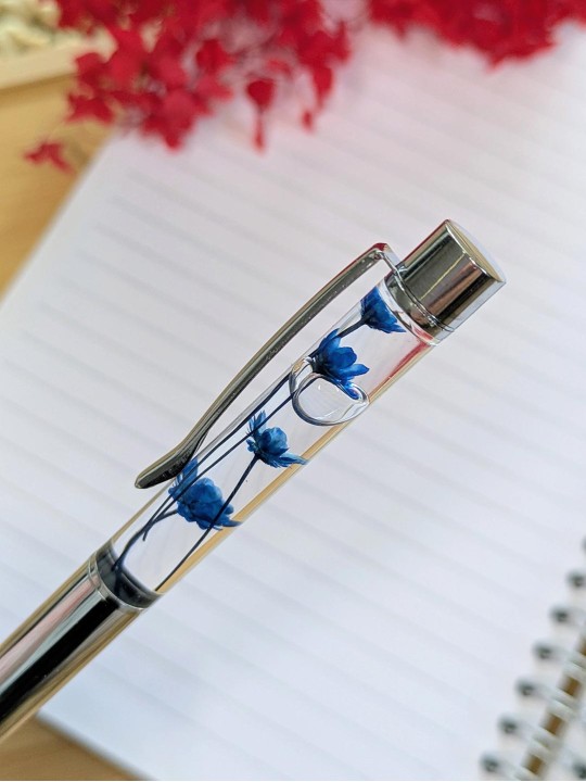 Stylo fleur immergée bleue