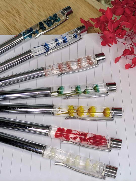 Stylo fleur immergée emeraude Stylo fleur immergée emeraude