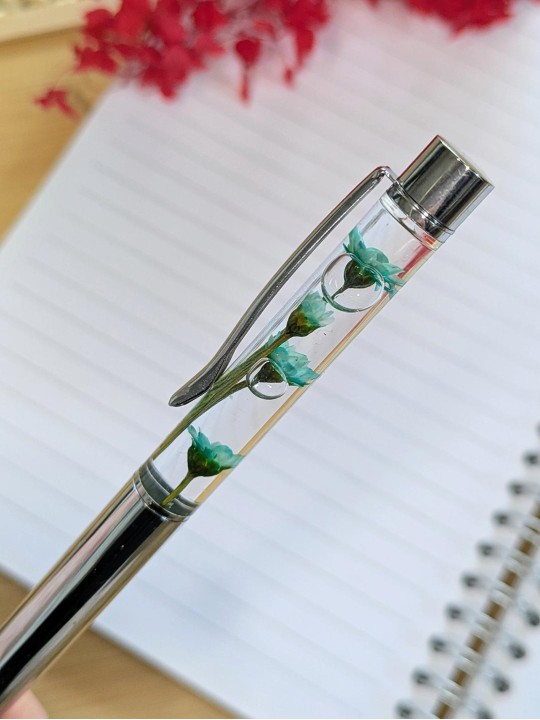 Stylo fleur immergée emeraude