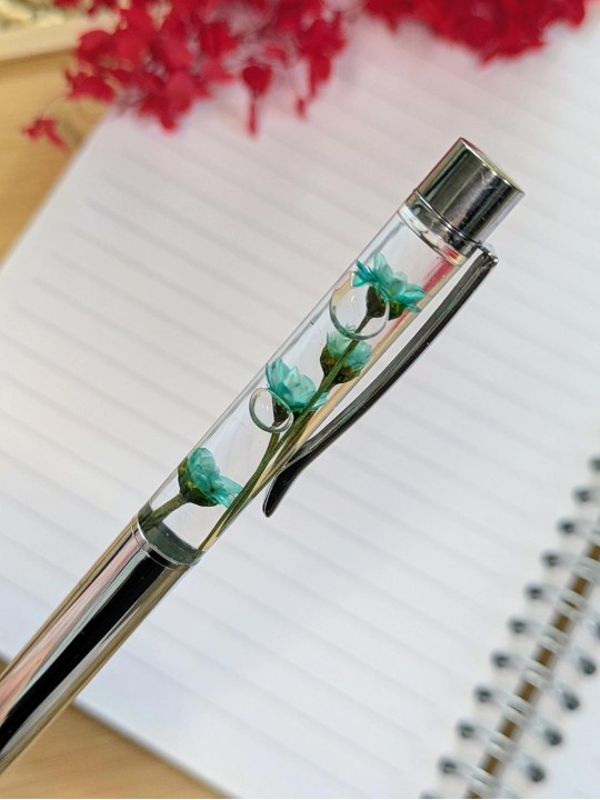 Stylo fleur immergée emeraude Stylo fleur immergée emeraude