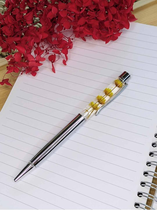 Stylo fleur immergée jaune Stylo fleur immergée jaune
