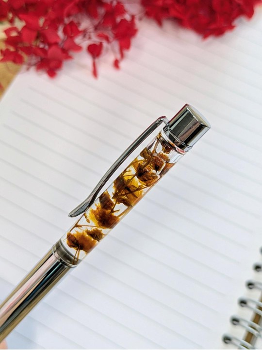 Stylo fleur immergée orange