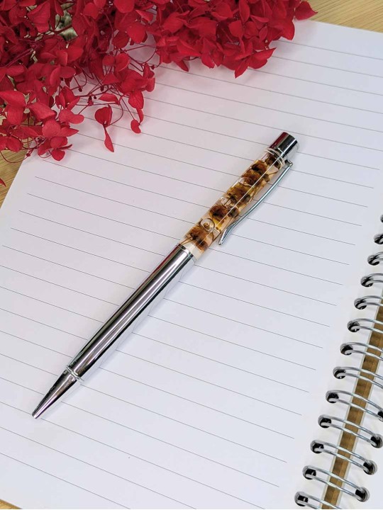 Stylo fleur immergée orange