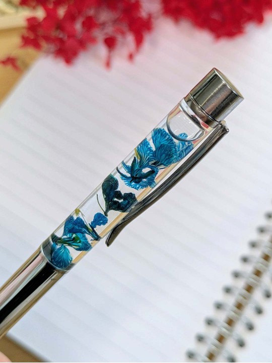 Stylo fleur immergée turquoise Stylo fleur immergée turquoise