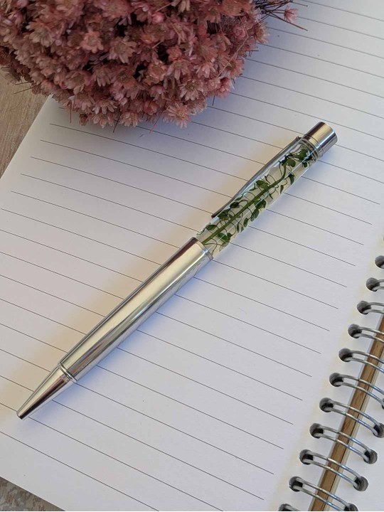 Stylo fleur immergée vert
