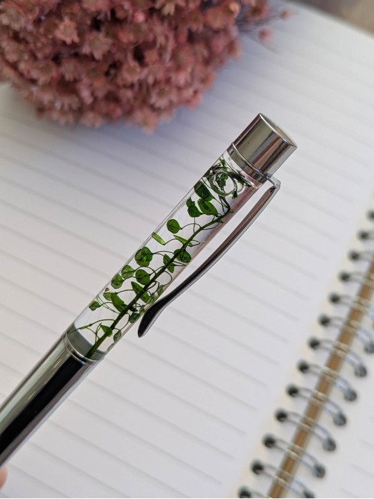 Stylo fleur immergée vert